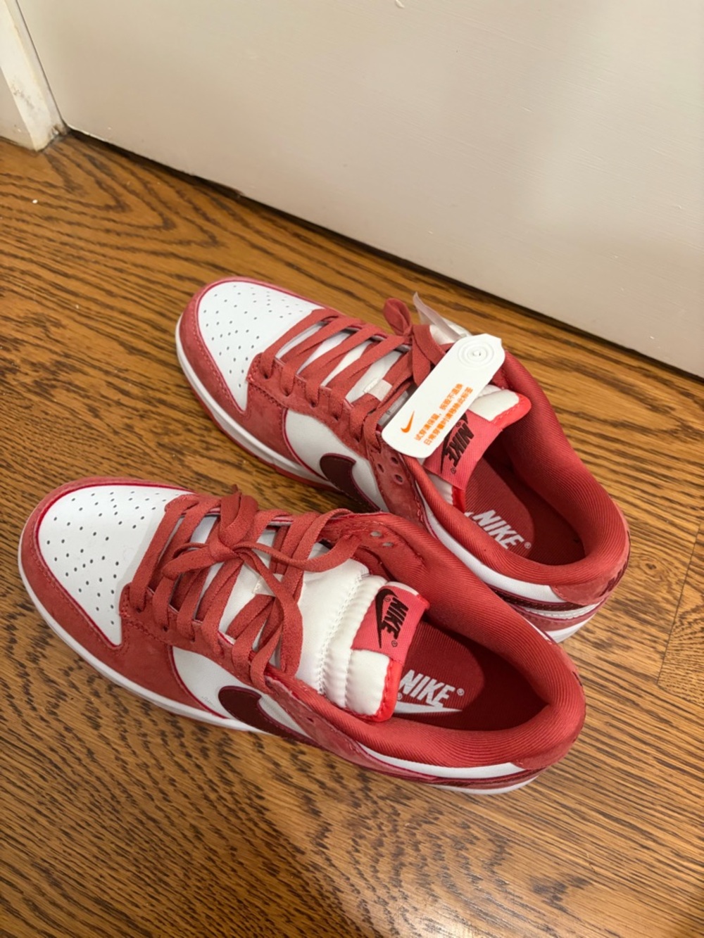 Nike Kids Red and White Low-Top Sneakers with Swoosh